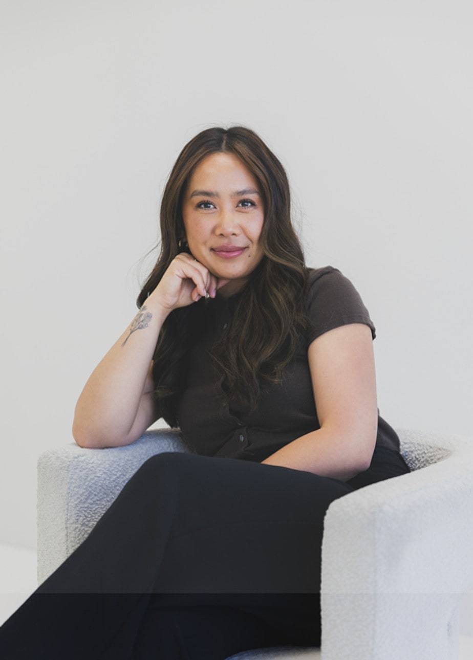 Camille Granda, Registered Clinical Counsellor, seated and listening
